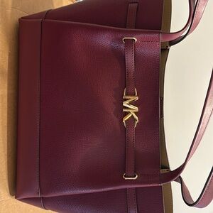 Michael Kors tote . Brand new never used . Still in the box it came in